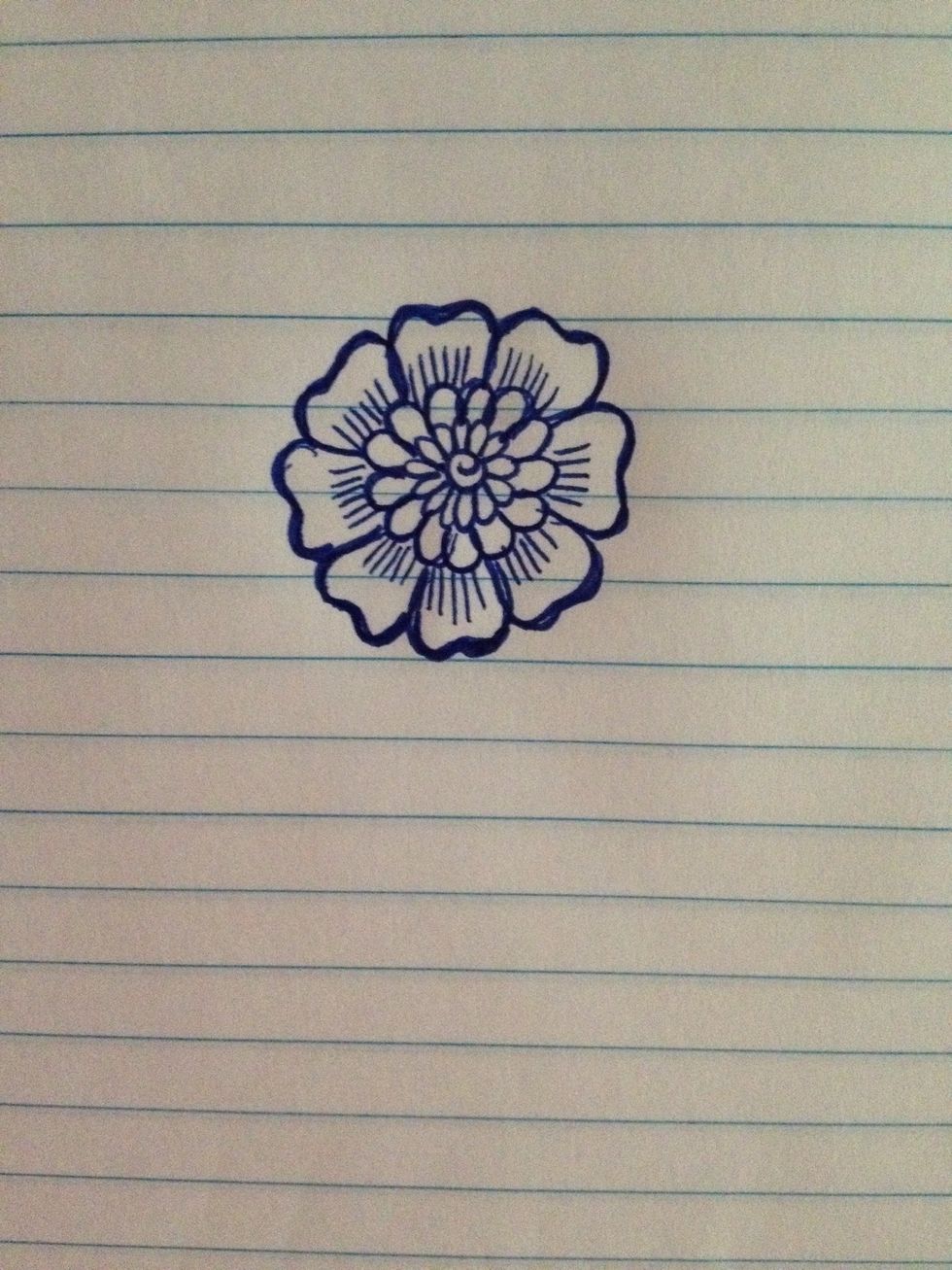 Darken all the lines by going over the flower with your ink pen.