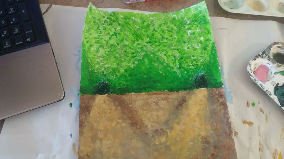 Darken in the openings with a darker color. for this i sued a shade of my green.