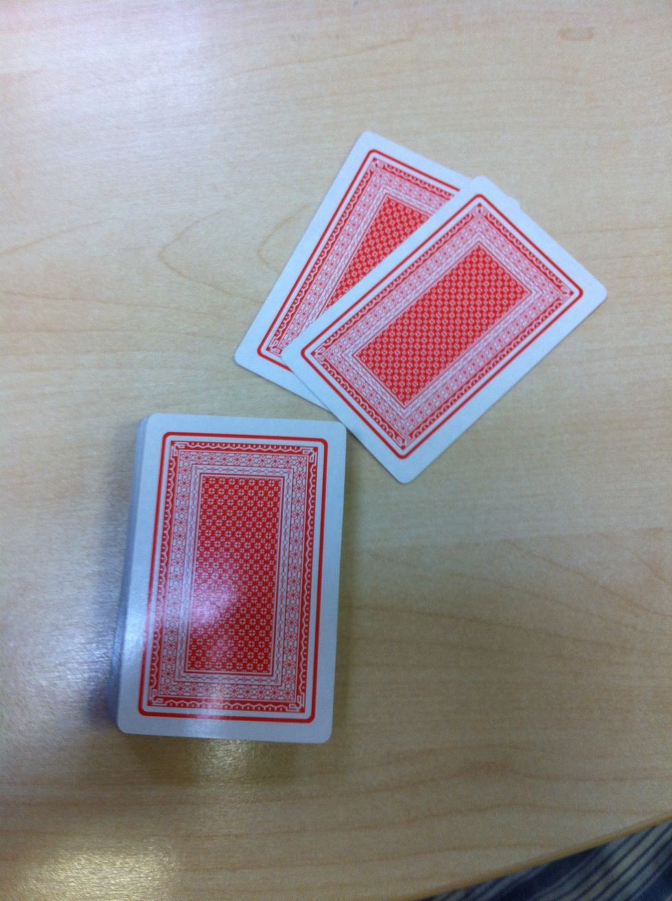 Deal the top two cards to someone.