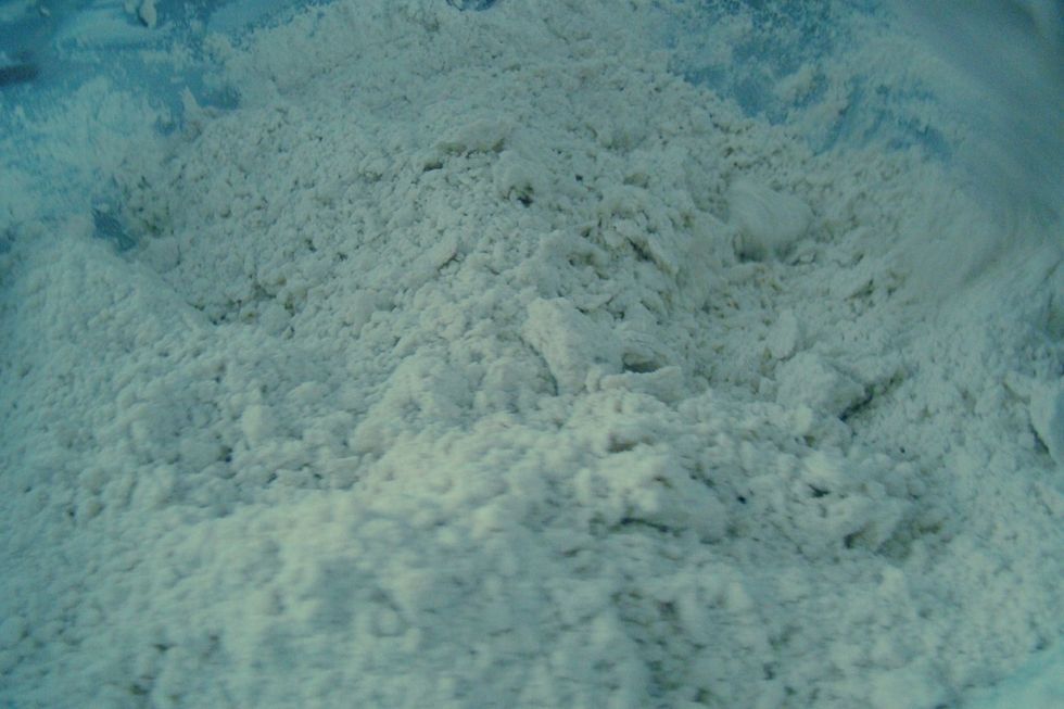 Debe tener una consistencia parecida a esta imagen, con tal de que quede impregnada toda la harina de manteca.