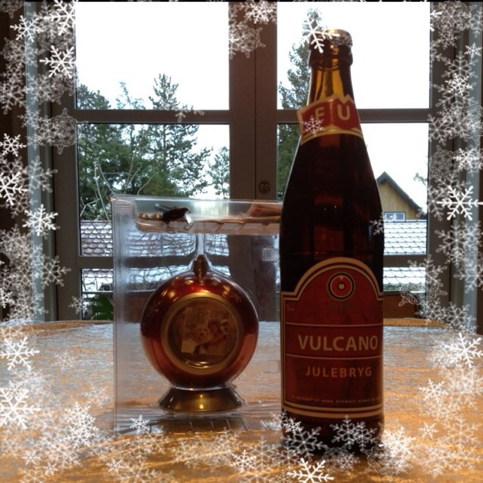 December 12th: A crazy bauble for Christmas decoration ... It's actually an electronic device and will display pictures of the grand children all through December + a Christmas beer