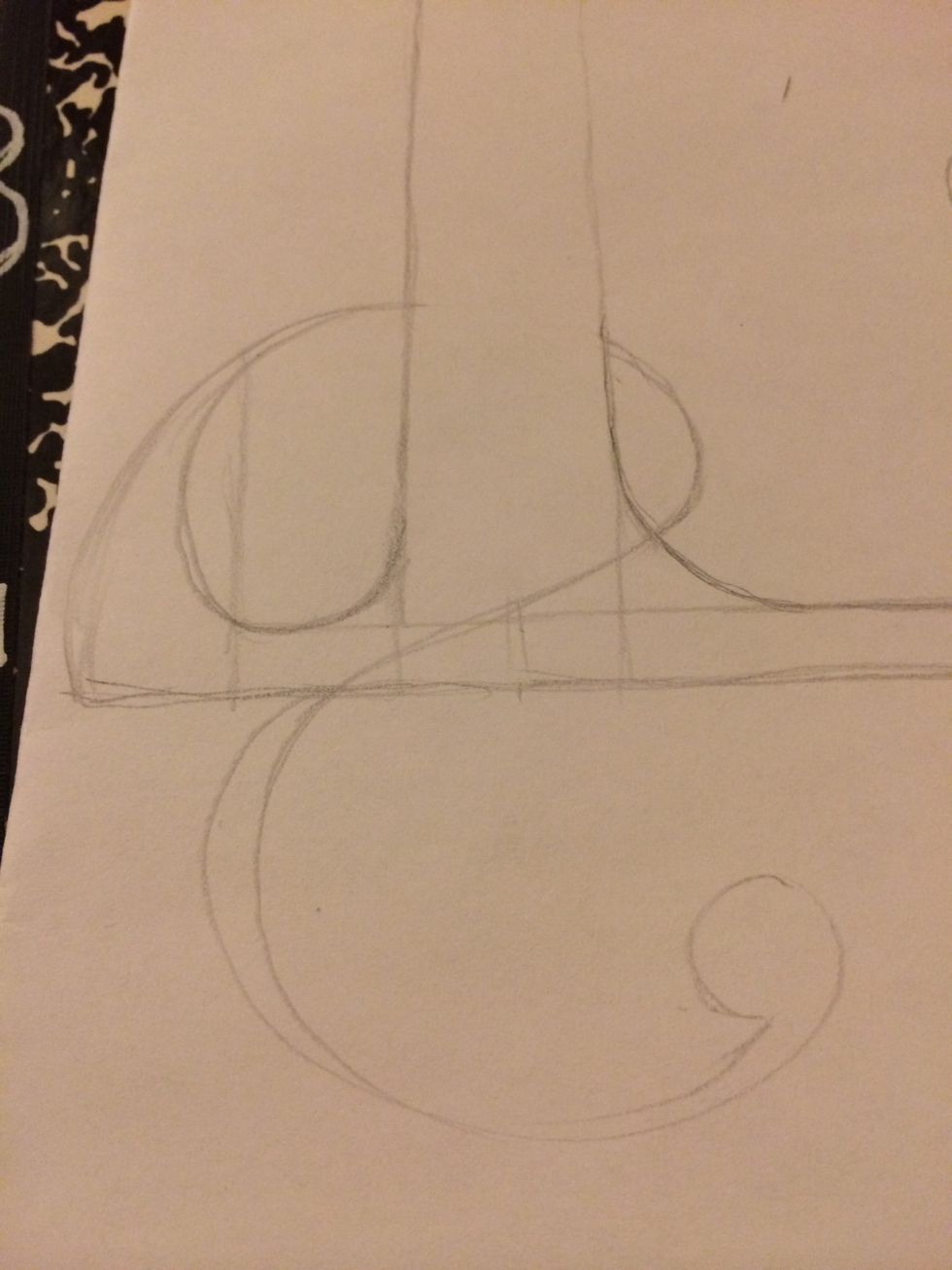 Decide if you want the curves/curls to show on top or below the letter and erase as needed