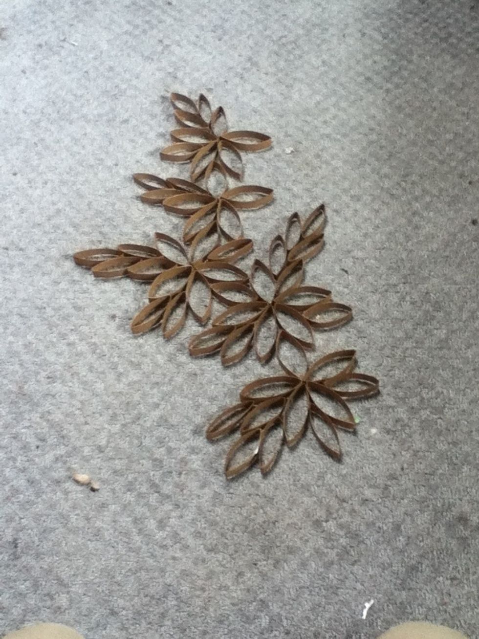 Decide on a design and use you hot glue gun to attach them.