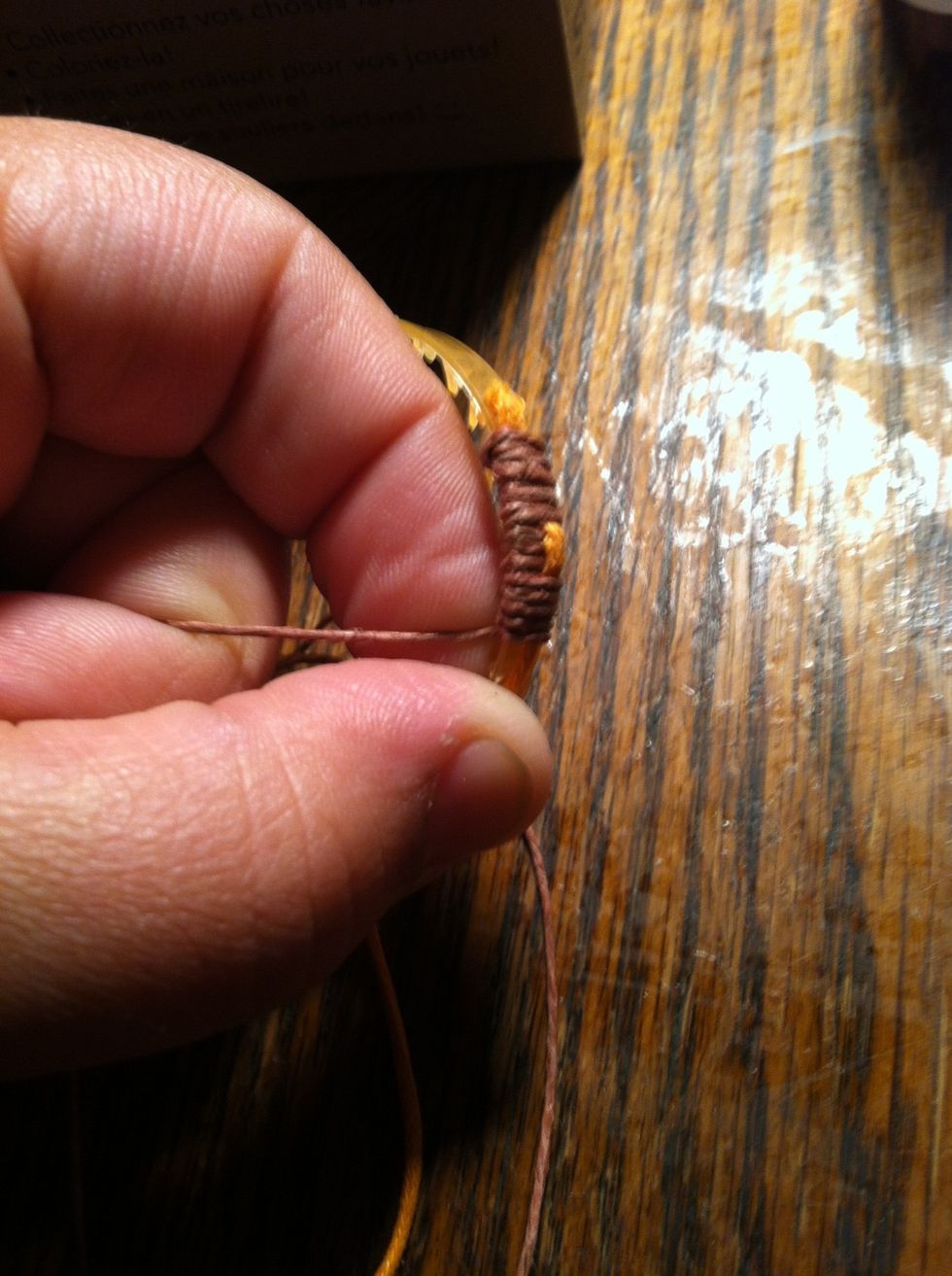 Decide on a pattern or design (or just freestyle it) and start wrapping. To do this I wrapped OVER my secondary color five times then lifted it up and wrapped under it 3 times. Then repeat.