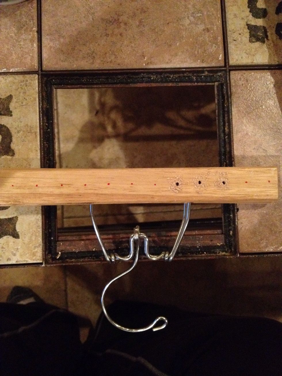 Decide the number & size of clothing items (tank tops in this case) you will hang. Space & mark holes then drill all the way through both pieces of wood.