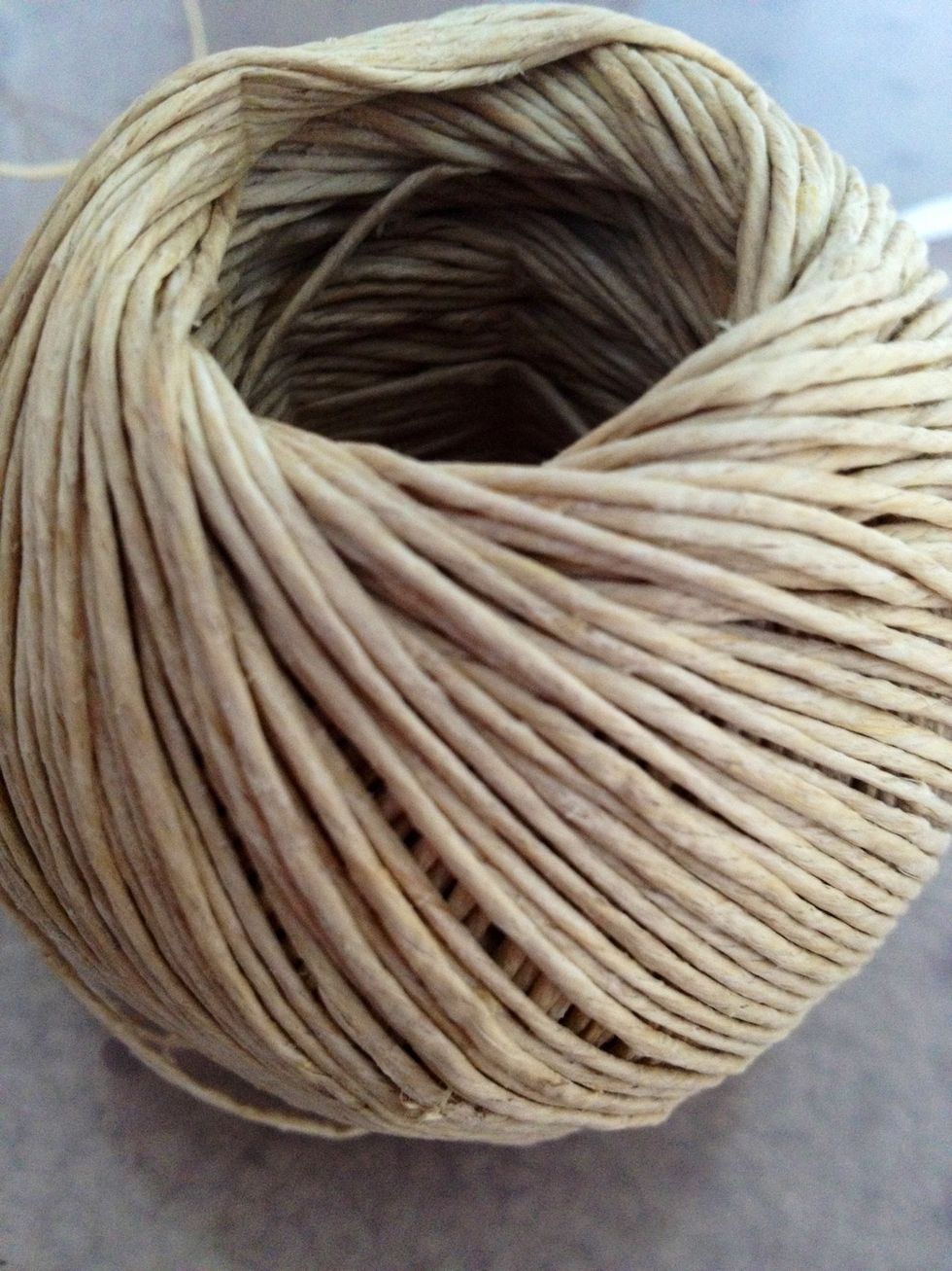 Decide what you want to wrap the ring with. It can be string, leather, ribbon, etc. I chose twine.