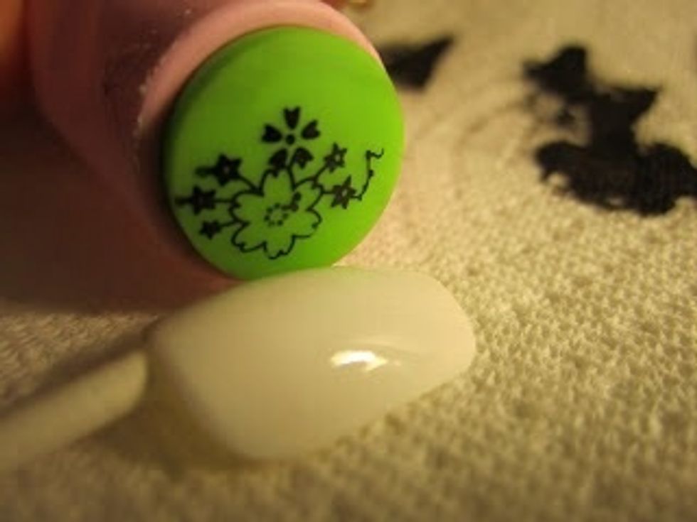 Decide where on the nail you want the stamp (it might take some practice).