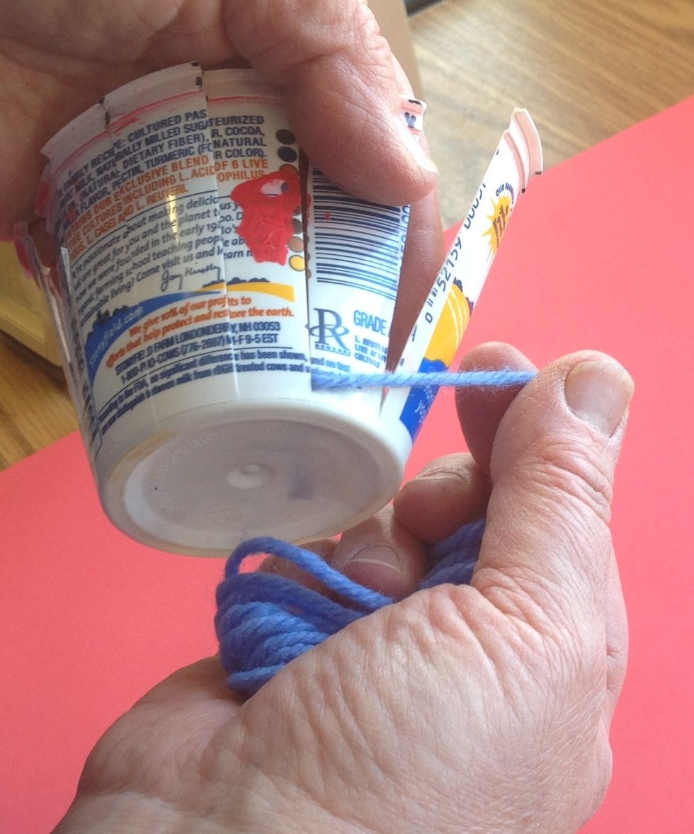 Decide which direction you wish to weave. This may depend on whether you are left or right handed. Whether you proceed to left or right you place the yarn OVER the first warp.