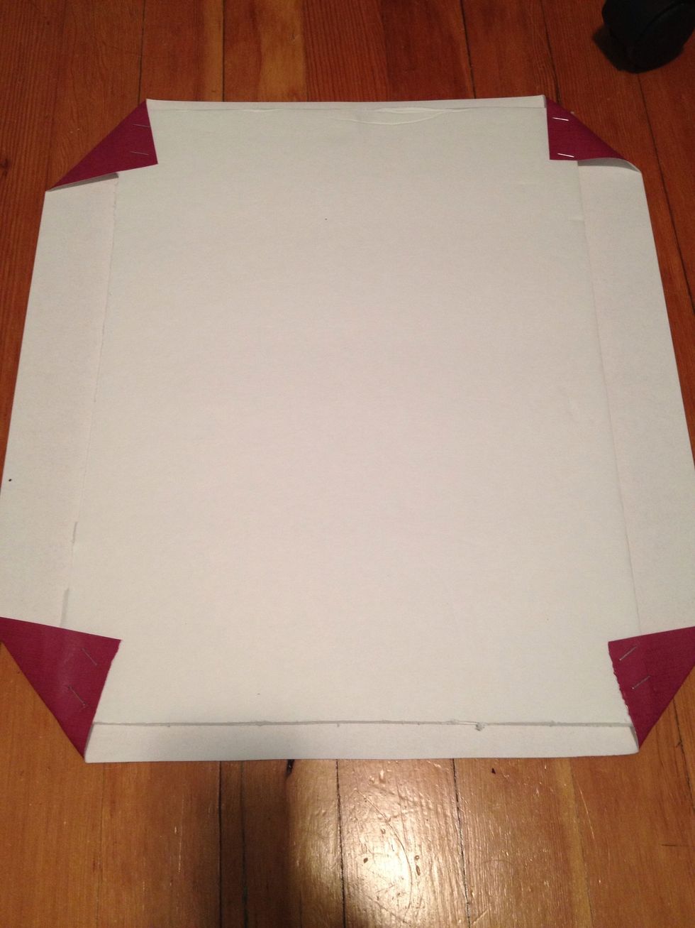 Decide which paper you want to use & make sure it fits on to frame. Place the photo frame backing onto the backside of the wallpaper sample. Fold over the corners like triangles and staple these down.