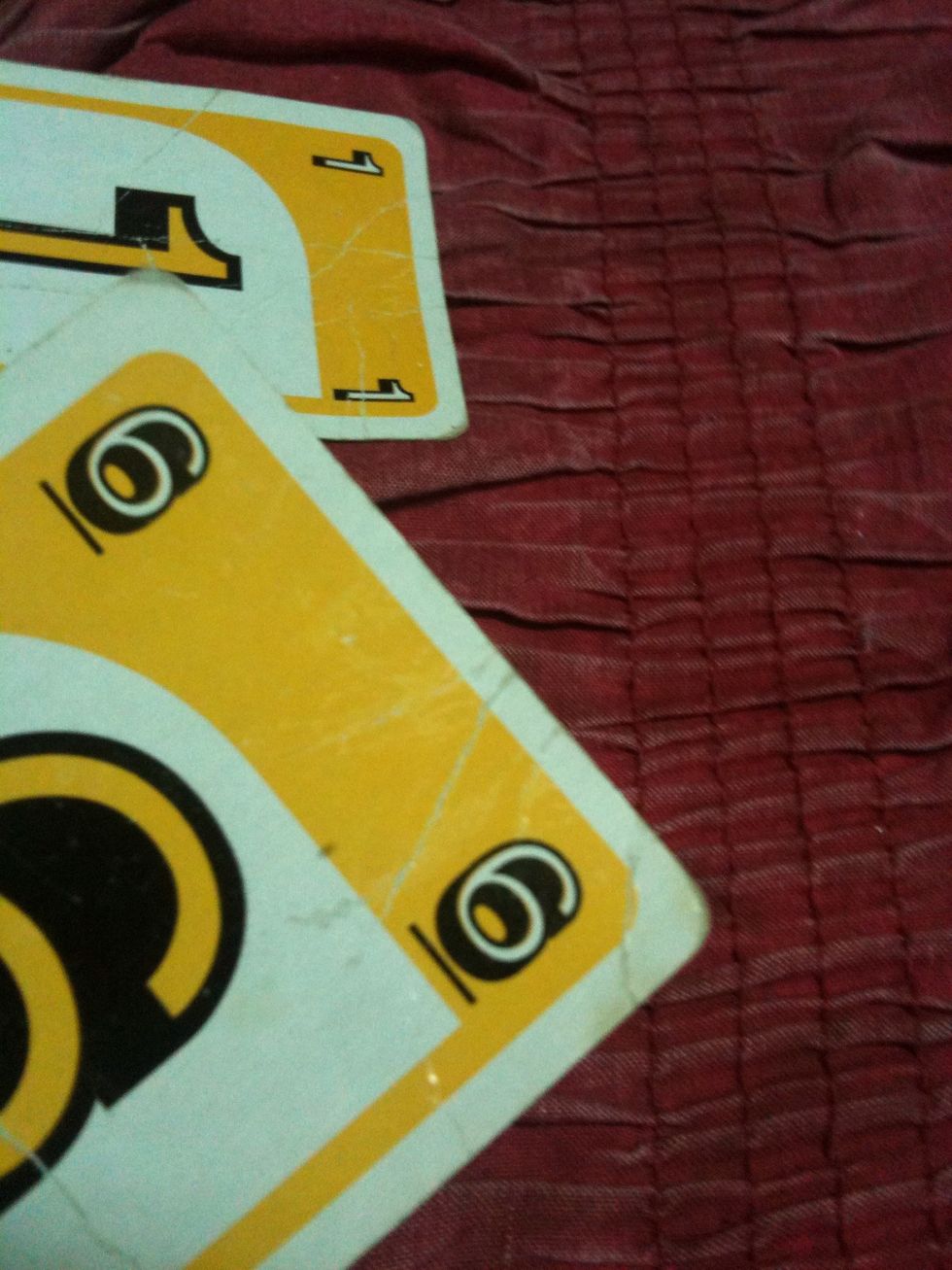 Decide who'll go first, in this case I'm the first to go, you can only place the card with the same color or number. The starting card is yellow-1,I'll choose yellow-6 because its of the same color