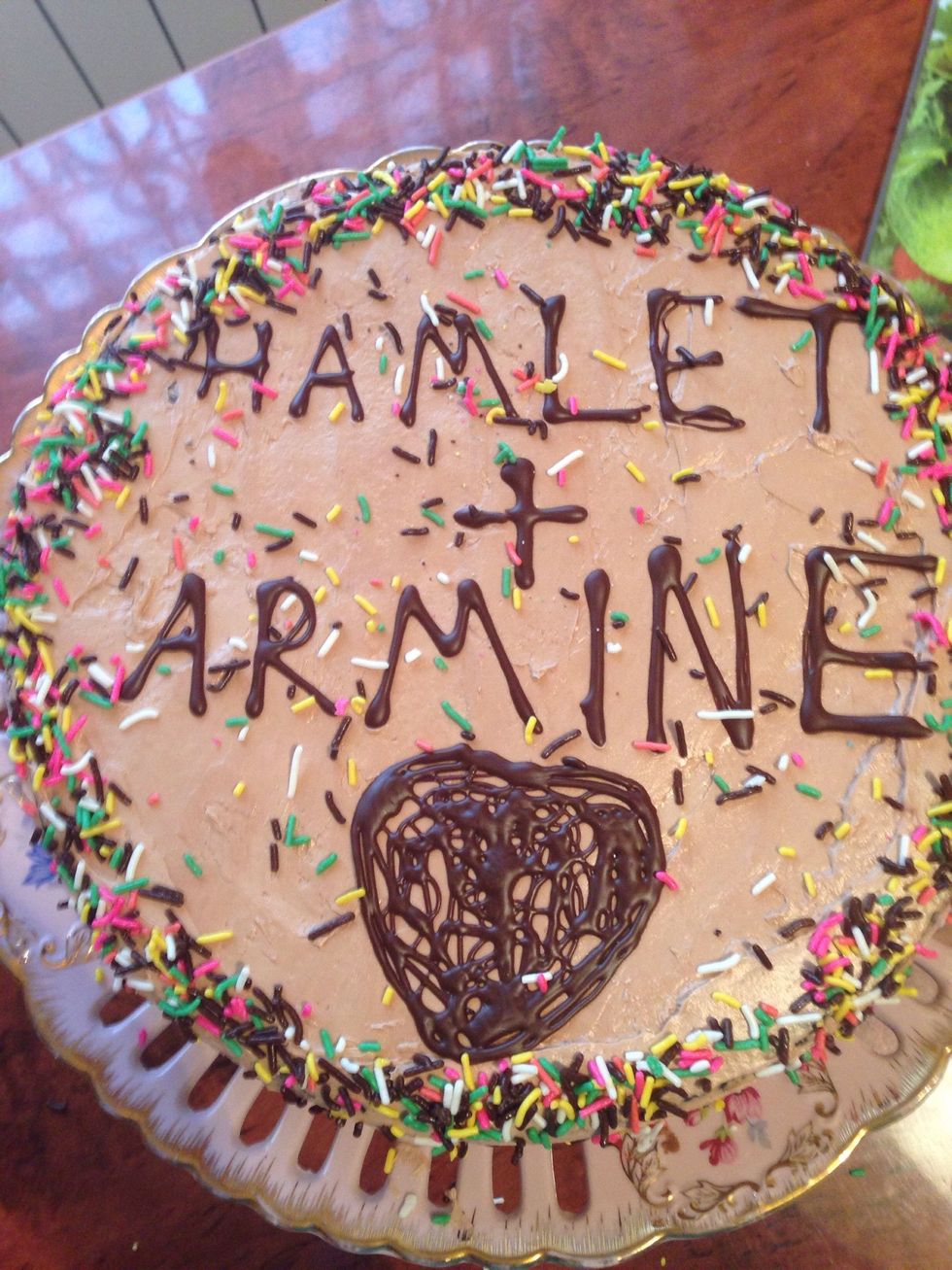 Decorate as u wish. Today is my parent's 24th wedding anniversary  \ud83d\ude0a\ud83d\ude0a so I have written their names on the cake.  I thing this will be a good surprise for them. Thank you for watching \ud83d\ude04\ud83d\ude04