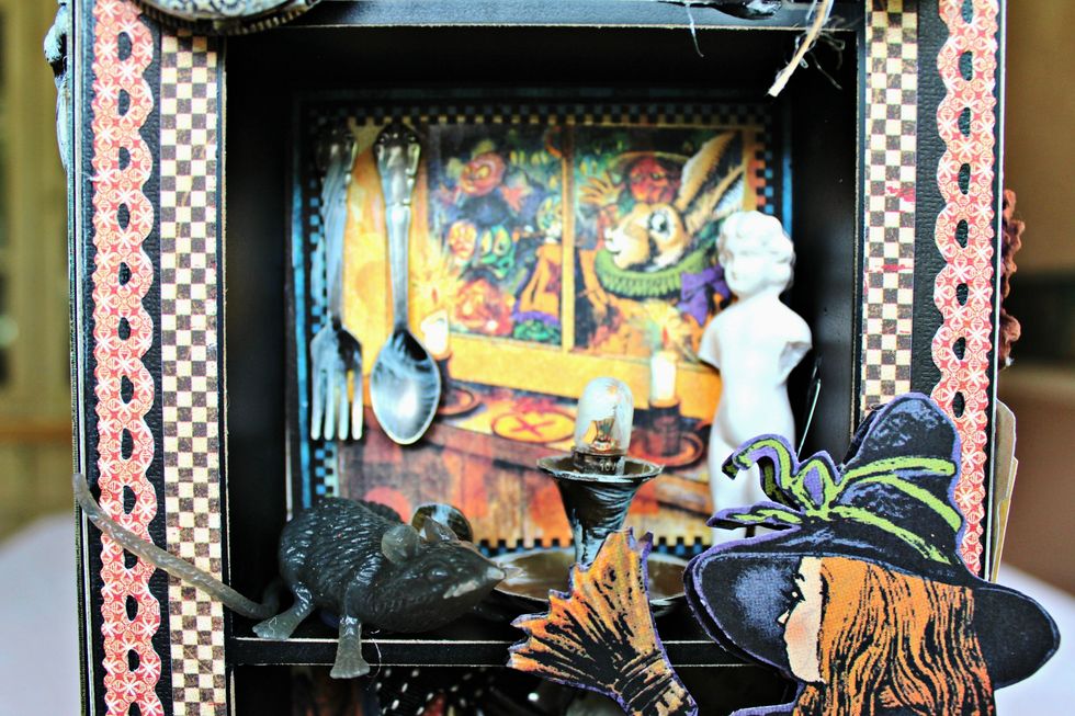 Decorate center space with a broken doll....