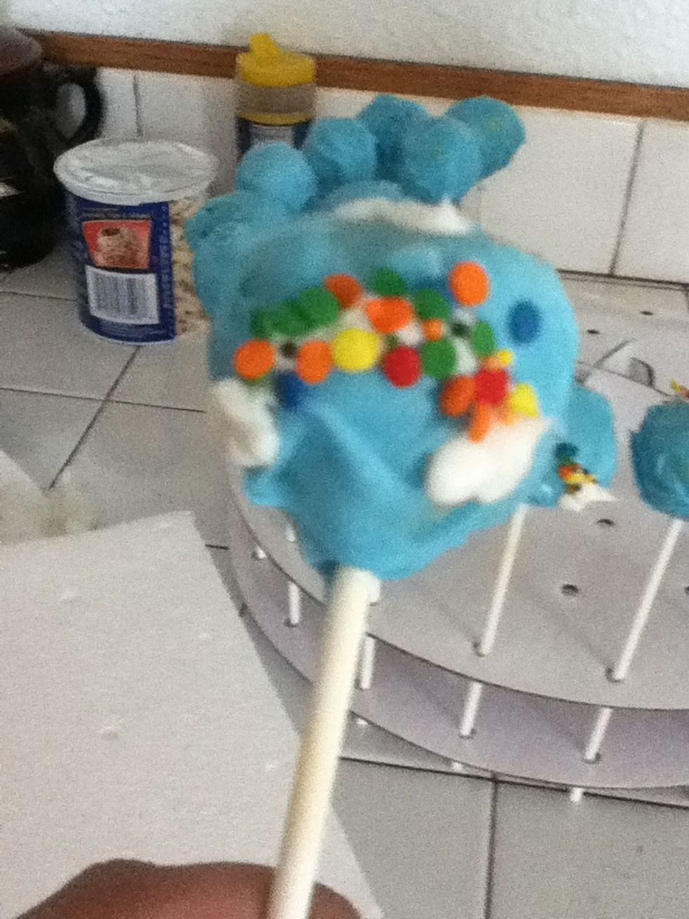 Decorate: here i used icing and sprinkles for rainbow cake pops