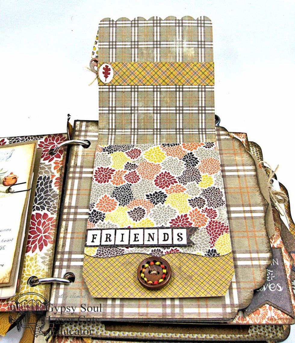 Decorate interior.  Glue just a small spot of tags/sentiments so that photos can be slipped behind.  (Watch my video tour on YouTube to see this in action.)