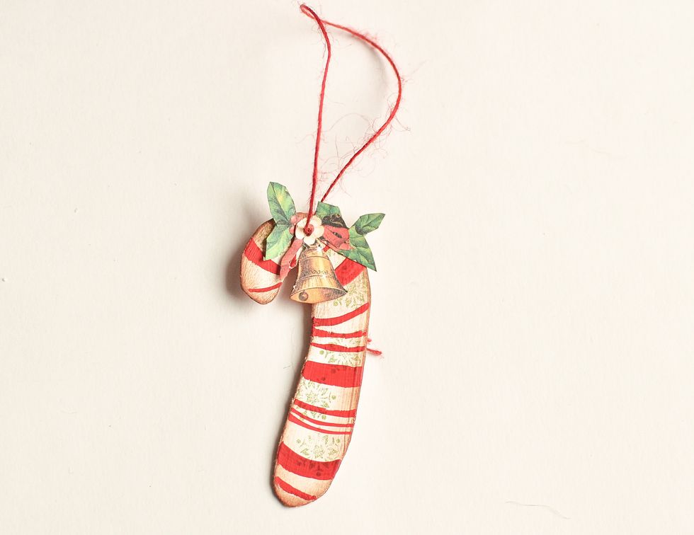 Decorate it with ready branches and bells, and put the rope through them