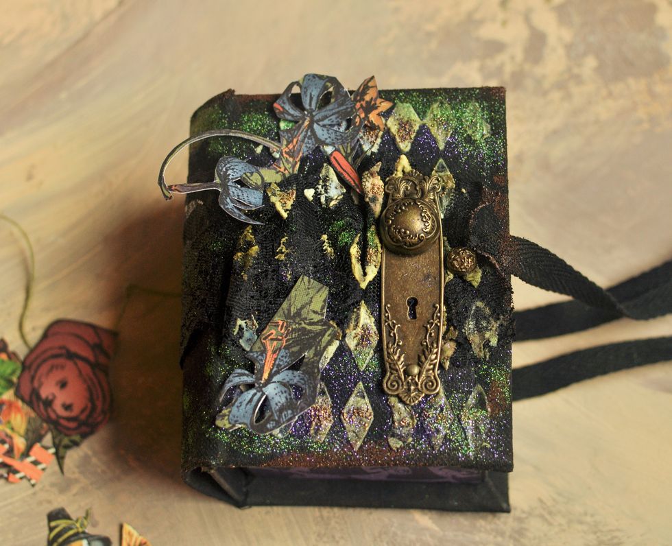 Decorate the cover with ready picture, which were cut before