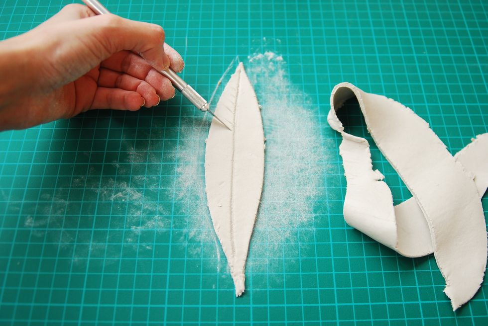 Decorate the shape with various examples that resemble rose, feather or texture of wood.