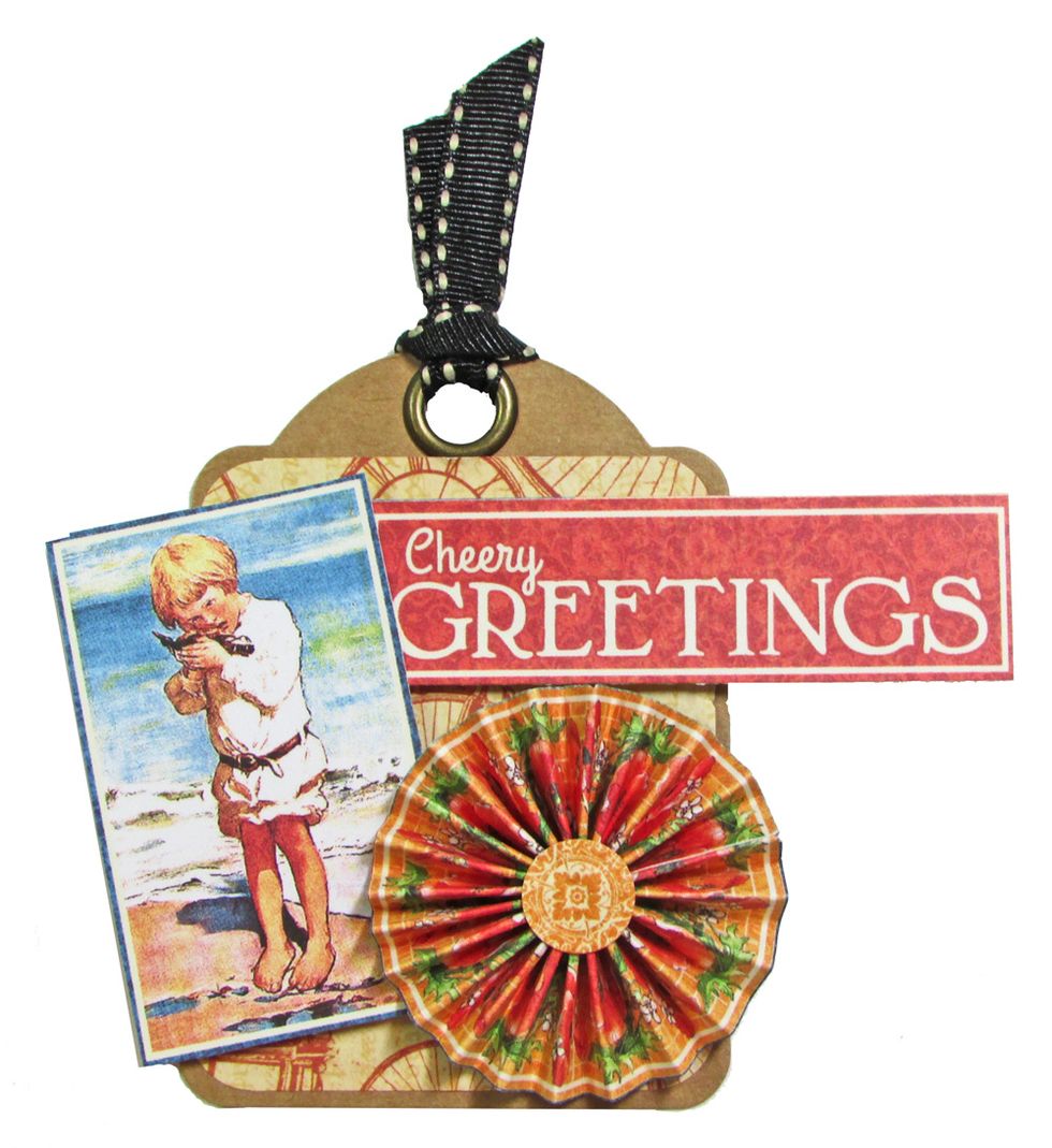 Decorate the tag with cut apart elements from Children's Hour July Collective paper. Create a rosette from one of the paper borders.