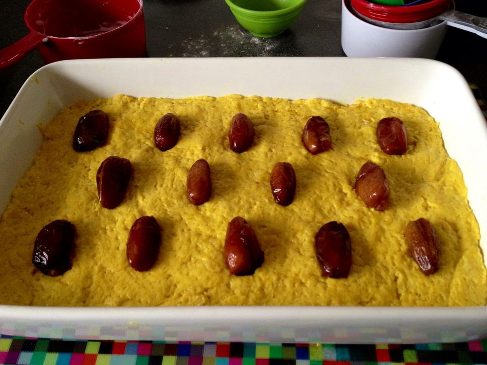 Decorate the top of the cake. I used giant cockroaches as I had them in the cupboard. Pistachios would work for those with recently acquired date-phobia. Sorry!