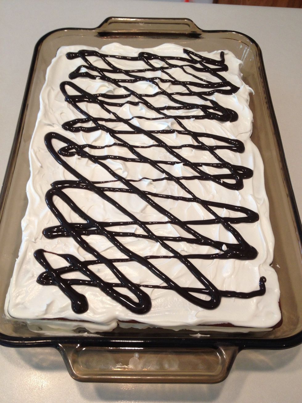 Decorate with chocolate syrup.