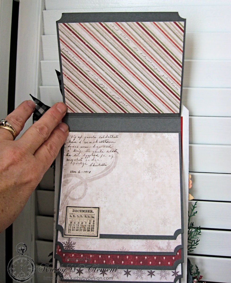 Decorate with designer papers and Tim Holtz Christmas Ephemera. The front of the tag is home decor...the back is a mini album. You can display either way.