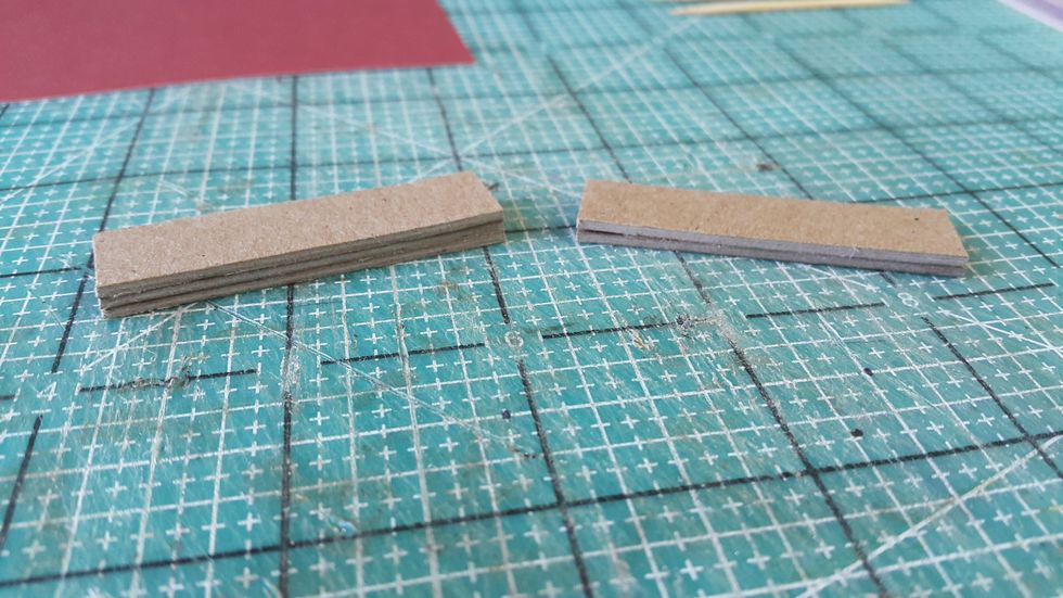 Decoration tips: For the explosion box house front door, cut few little strips of scrap chipboard, adhere together for thickness