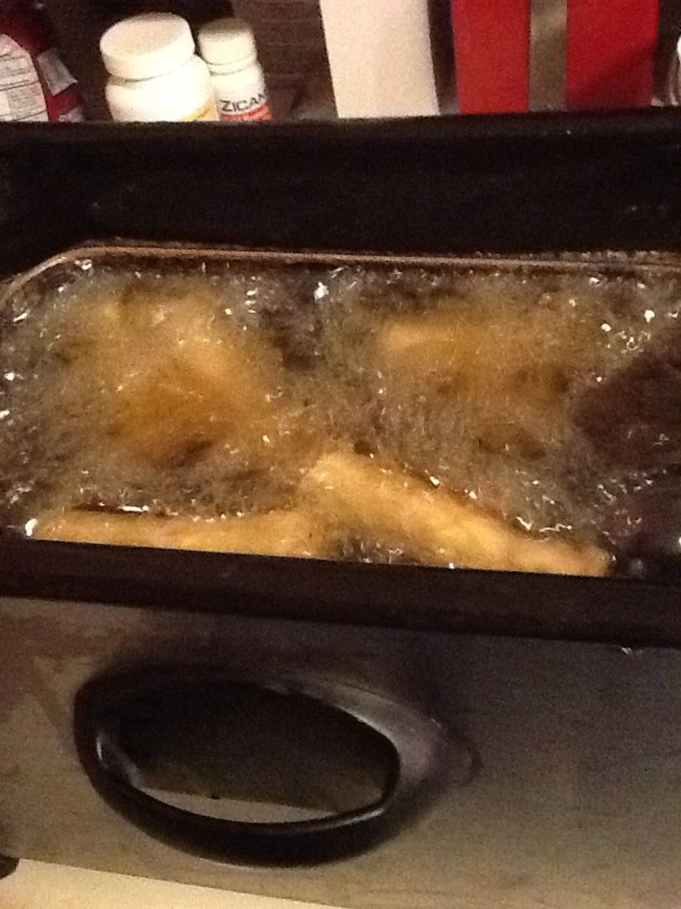 Deep fry in vegetable oil. I used a deep fryer set to 350. You can do it on the stove top too. When they are golden and floating, they are done. If they are brown but not floating, turn down heat.