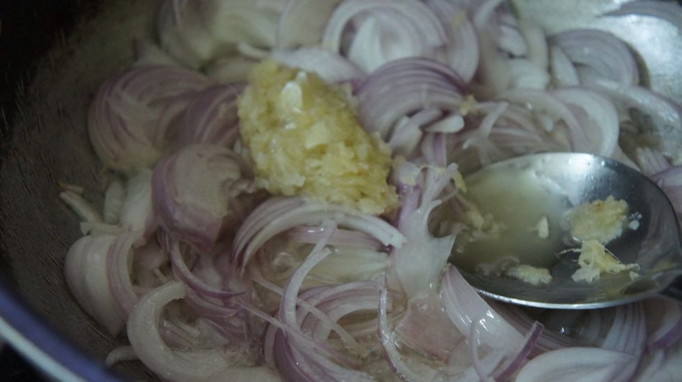 Deep Fry onions and chopped ginger garlic paste in a pan till onions become golden brown in colour...