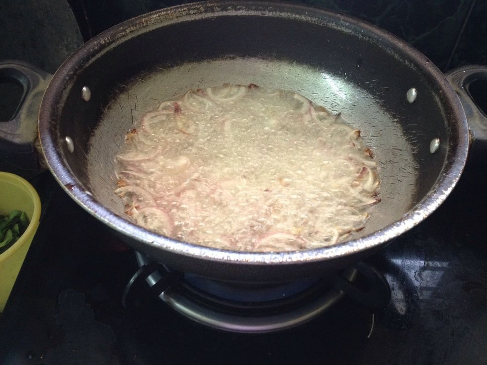 Deep fry onions and keep it aside..