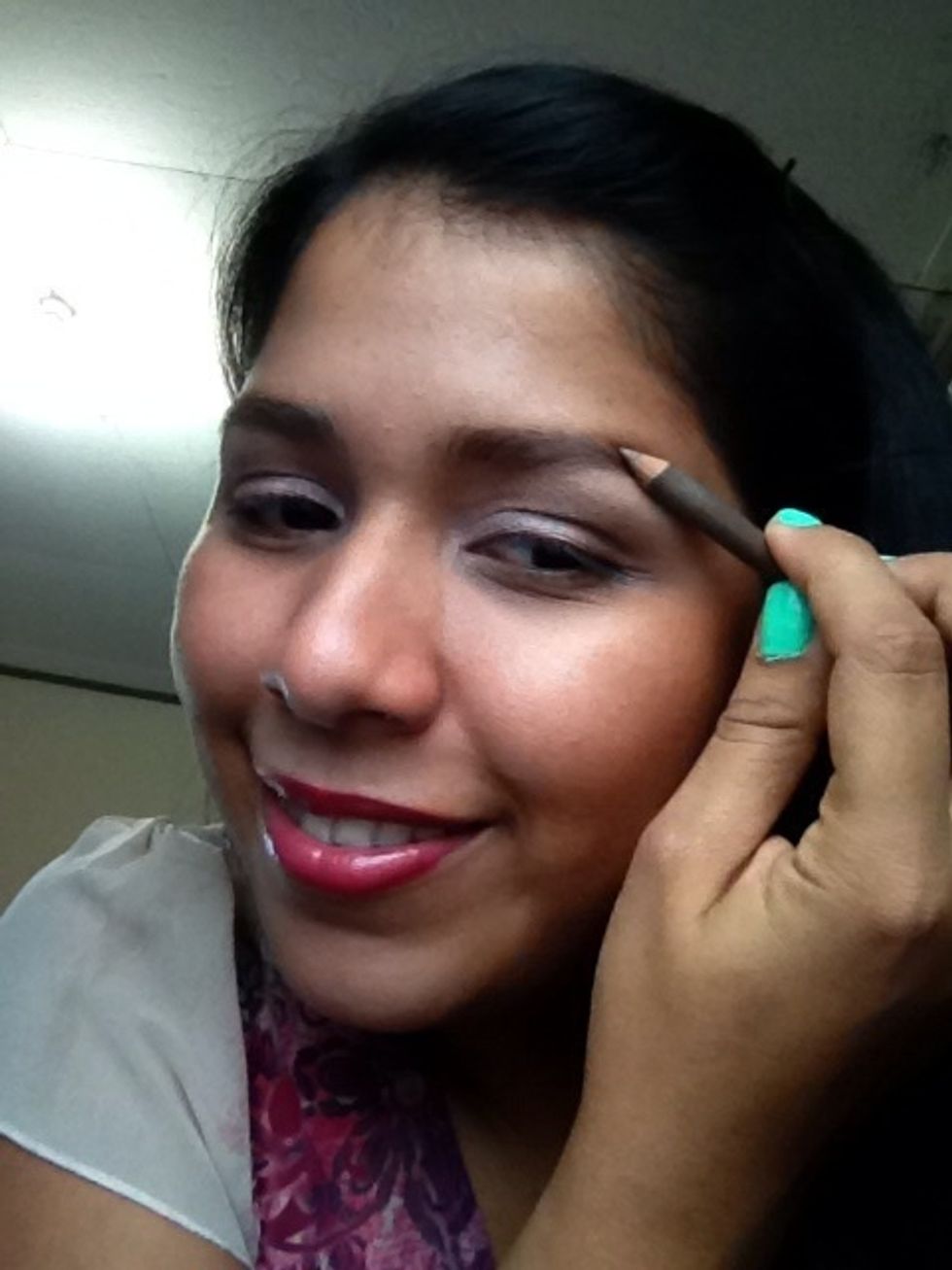 Define your eyebrow. This is a NYC brow pencil.
