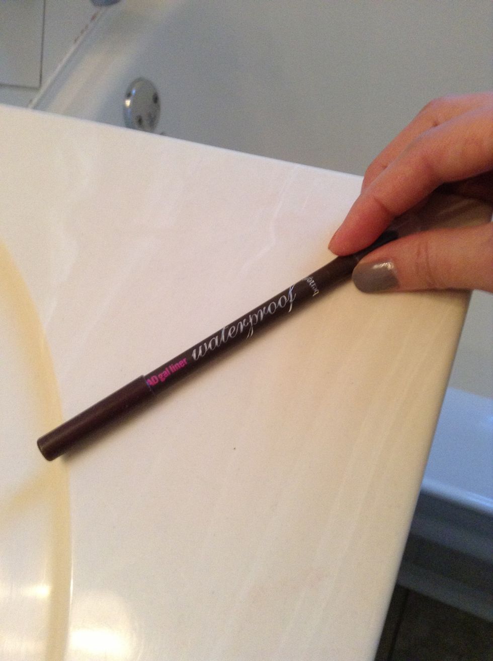 Definition around the eyes is also a must, so use a brown pencil to line the lashes ...