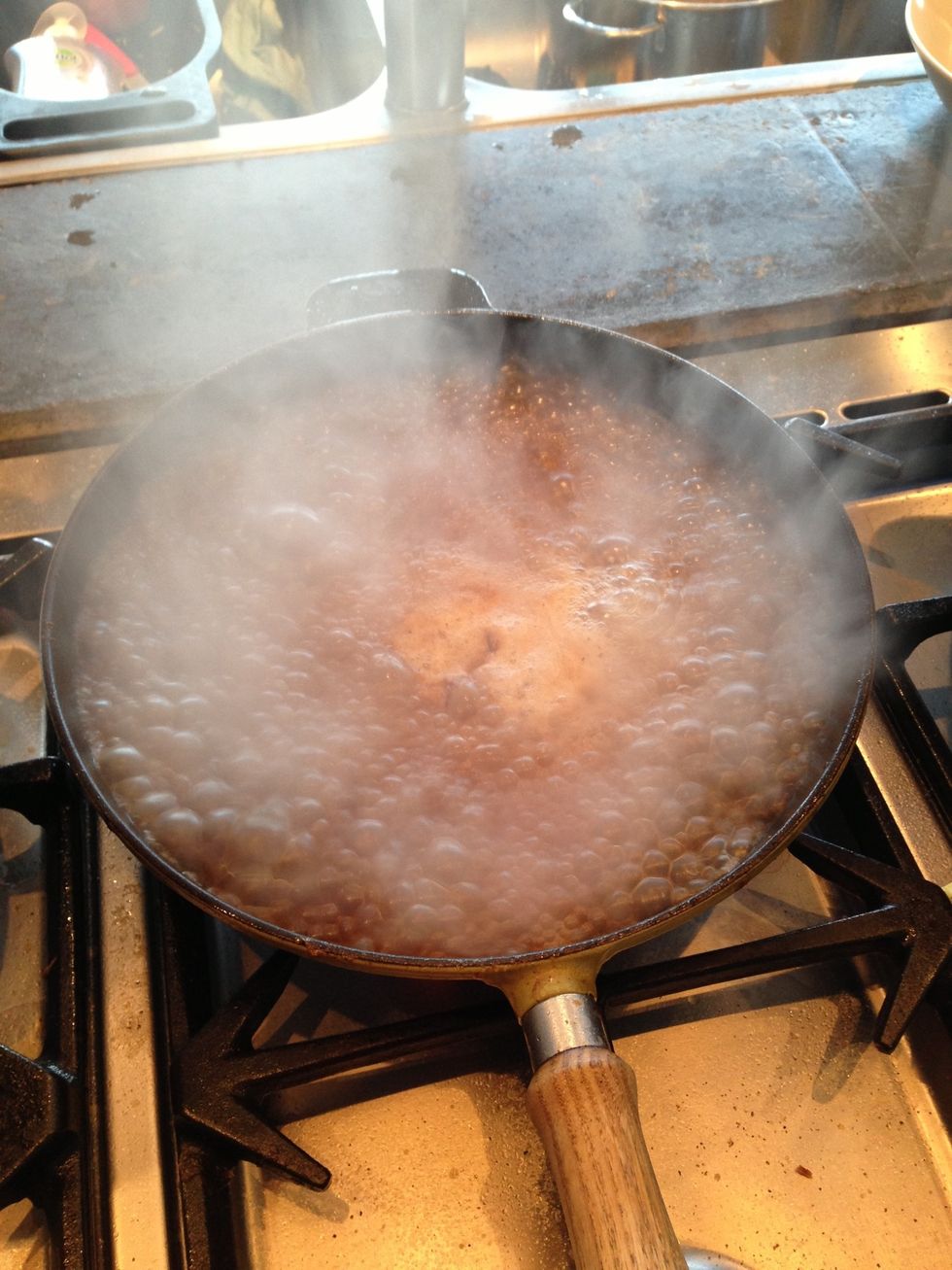 Deglaze the pan with a quarter of the bottle of beer.