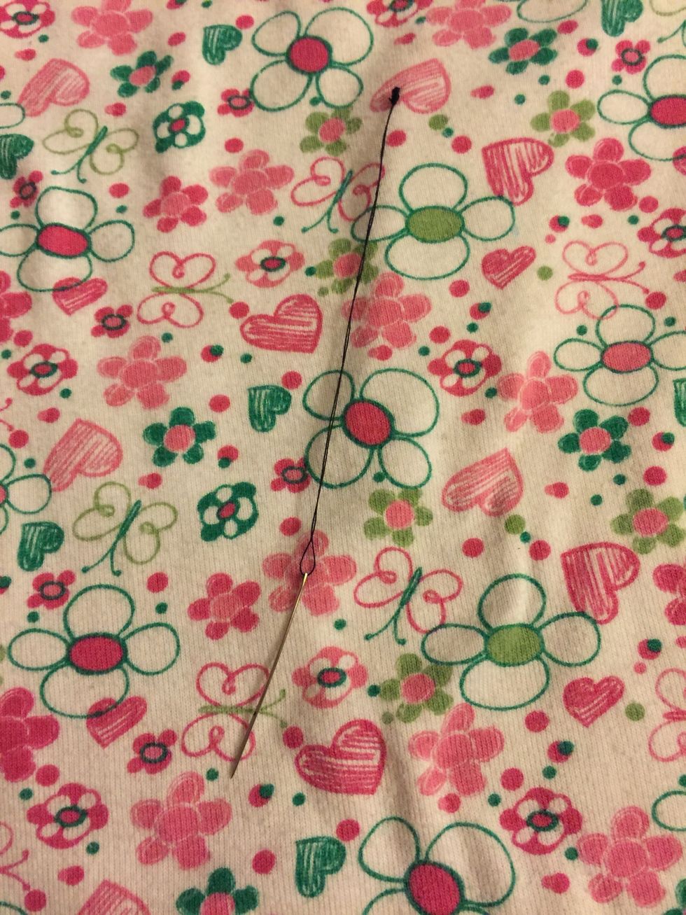 Depending how big your paper is get a longer piece of thread