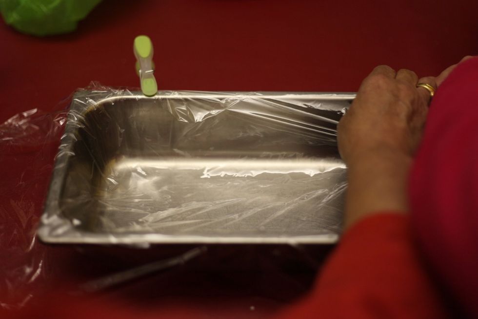 Depending on the amount of mixture you end up with, line a bread tray (about 12cm deep) with plastic glad wrap and if you're doing it alone, use pegs.