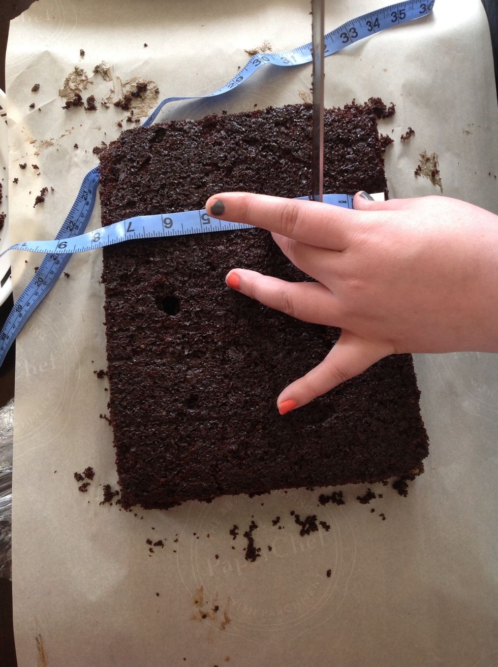 Depending on the final shape you want begin to cut your cake into the cubes