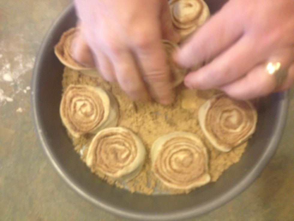 Depending on the size of your pan you could comfortably be able to fit 8 to 10 with at least half an inch in between.