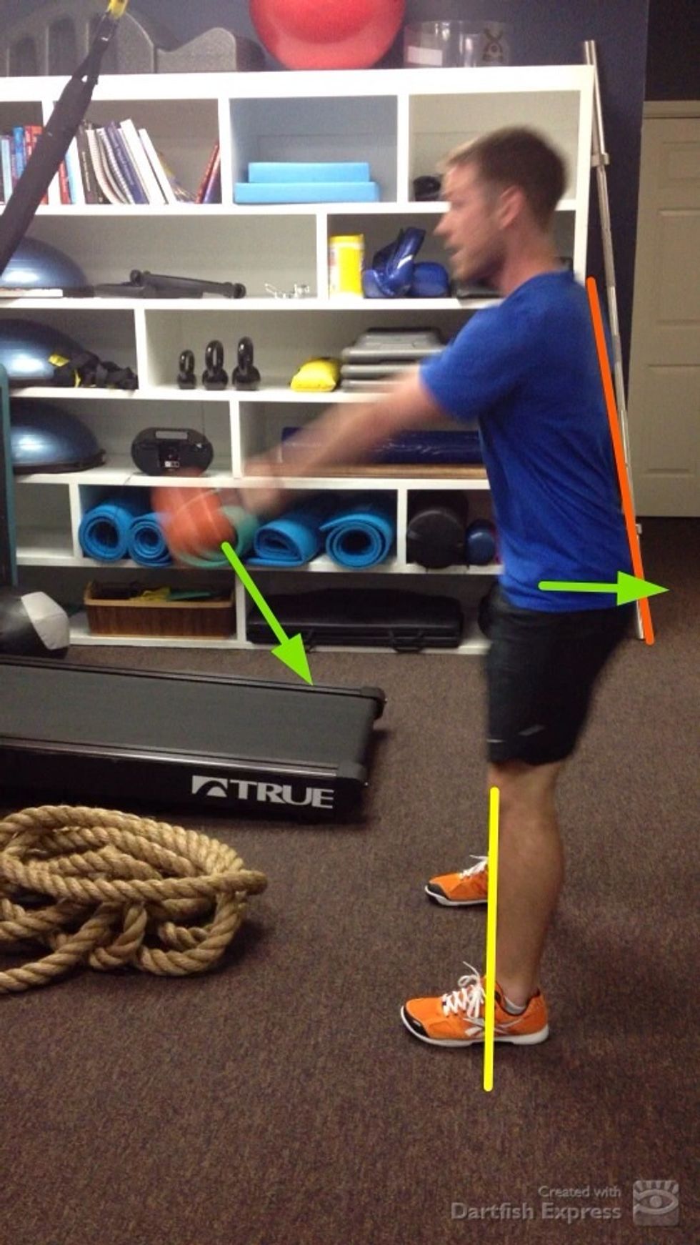 Descent should be smooth and controlled. Maintain a neutral spine and hinge the hips backward while bending the knees (maintain vertical shin) to lower the kettlebell.
