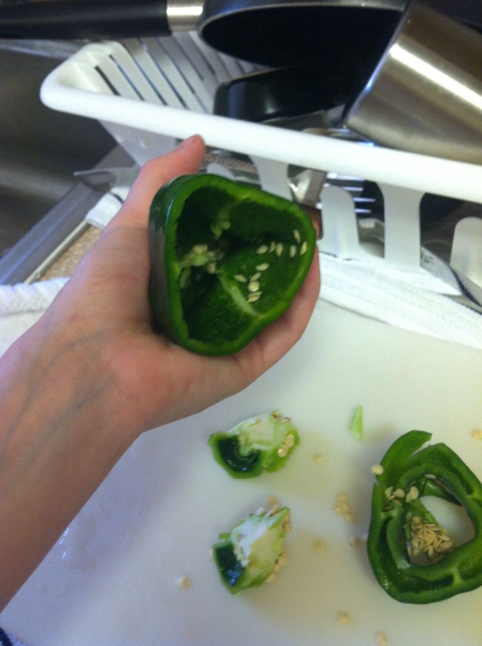 deseed peppers like so, this makes it easy and faster when it comes time to grill them.