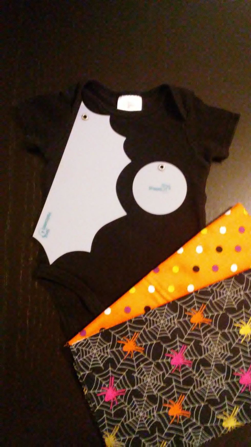 Design your onesie like you would a card or layout. Use Kiwi Lane Halloween Accessory set. https://lindsay.kiwilaneinstructor.com/store/default/shop/designer-templates/accessories/halloween.html
