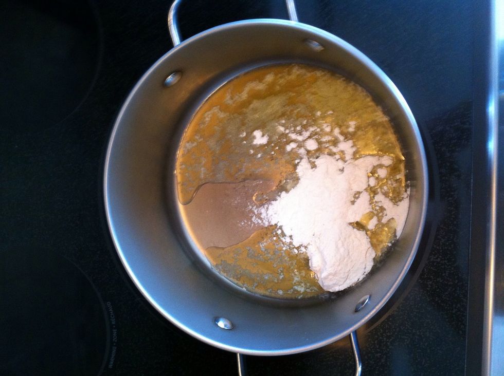 Desolve butter over low heat and had flour.