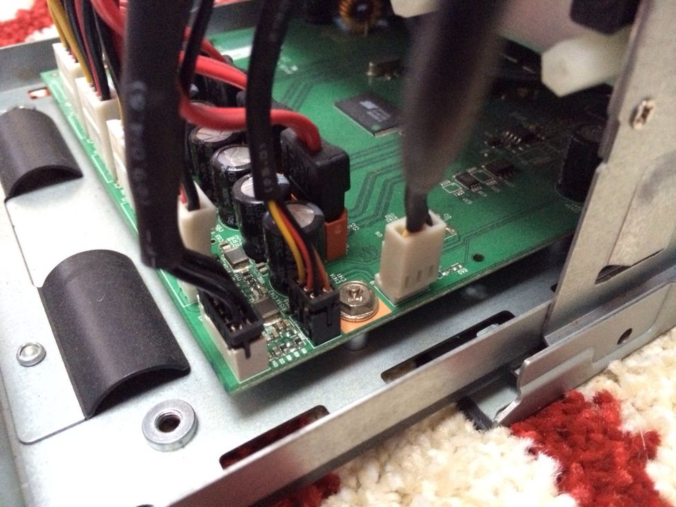 Detach the fan cable (it is the right one)