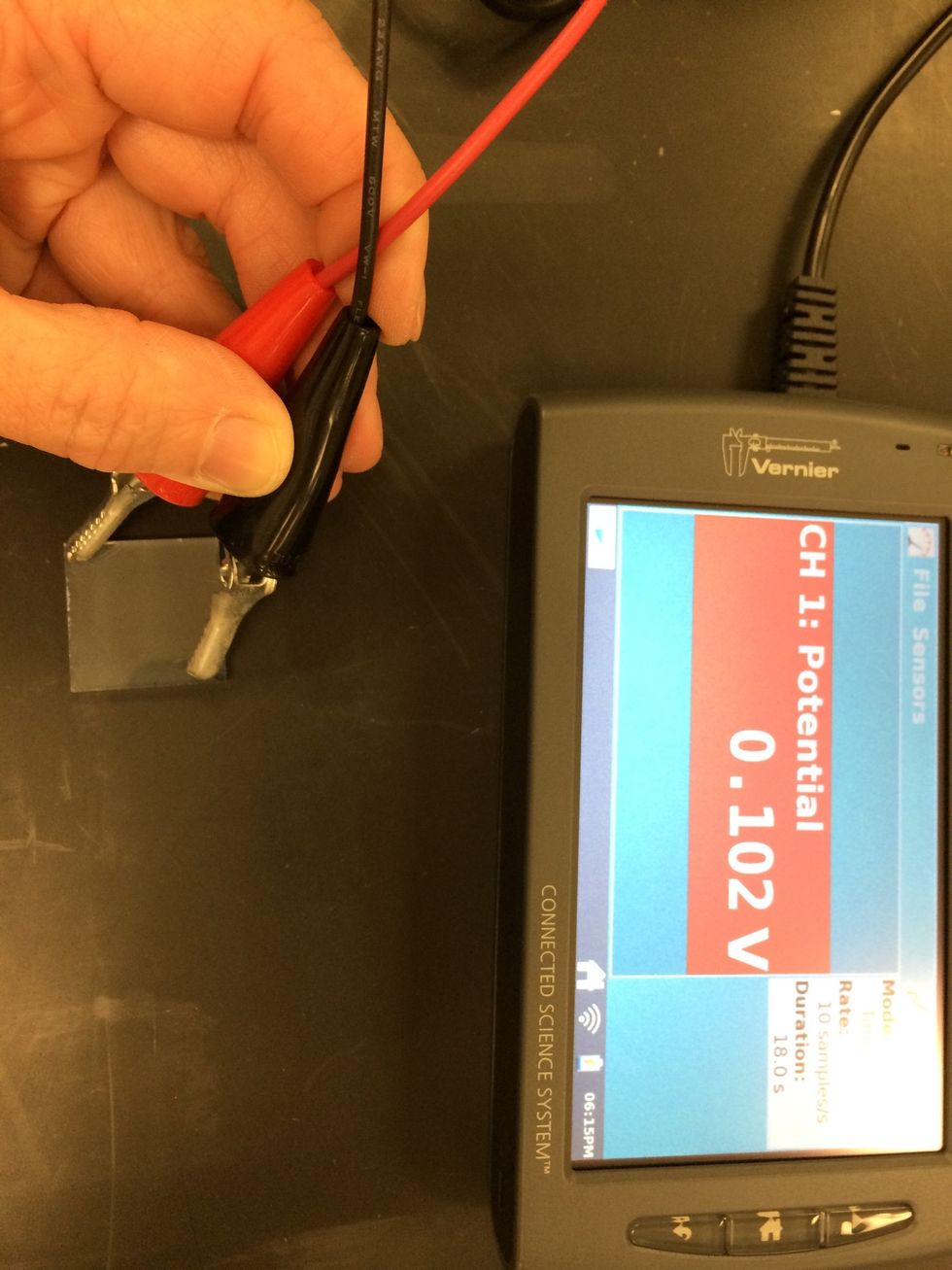 Determine which side of glass is conductive using a multimeter set to ohms.