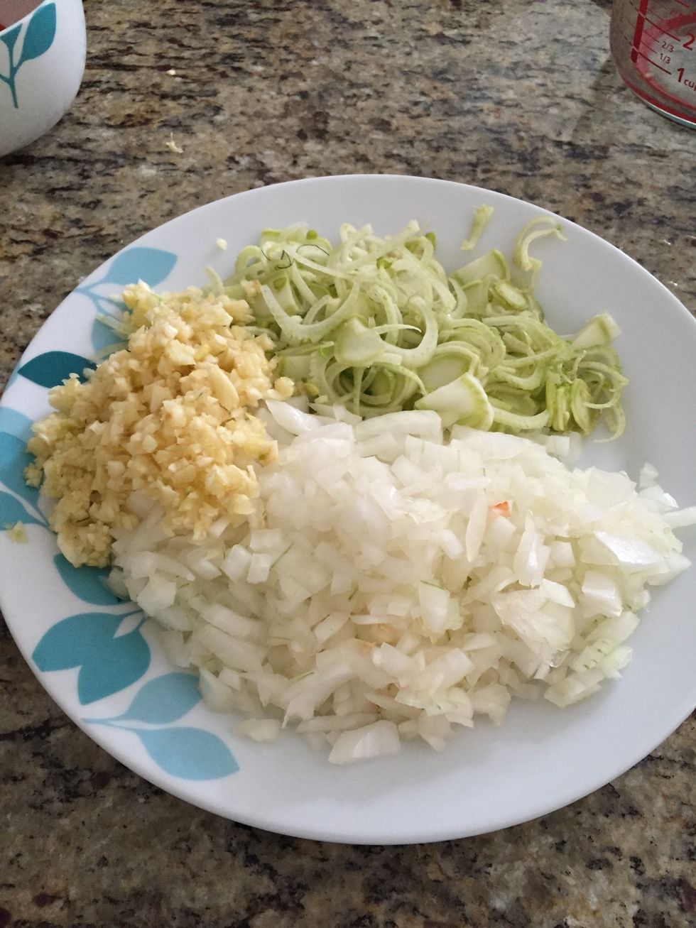 Dice 2 cups of onions, 1 head of garlic and 1 cup of fennel