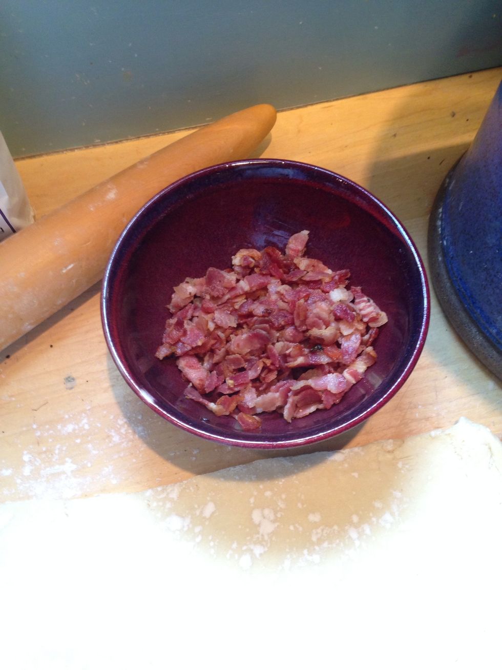 Dice and cook 12 rashers of thin and crispy bacon in quite a bit of olive oil