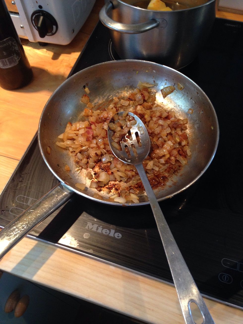 Dice and fry up 1.5 onions in olive oil (you could also fry the bacon in the next step with the onions)