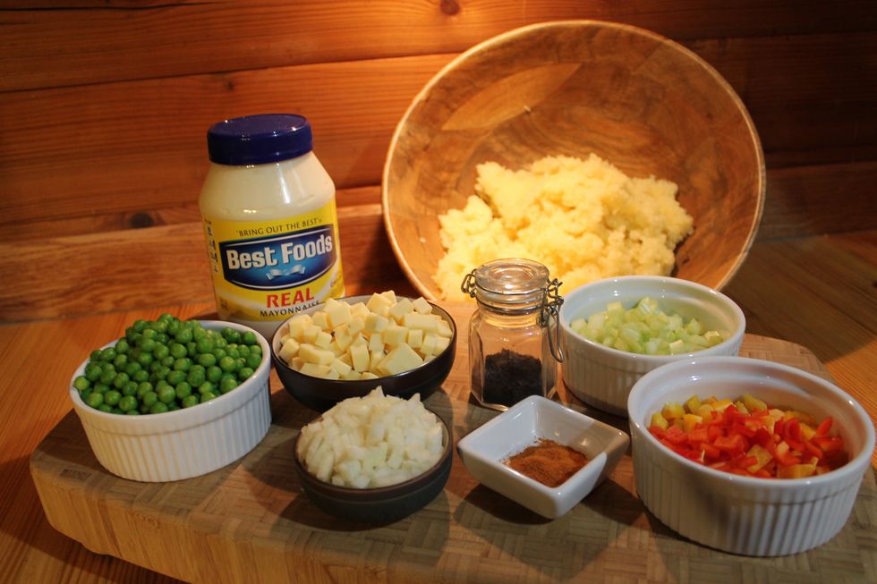 Dice cheese, onion, celery and peppers to be equal to pea size.