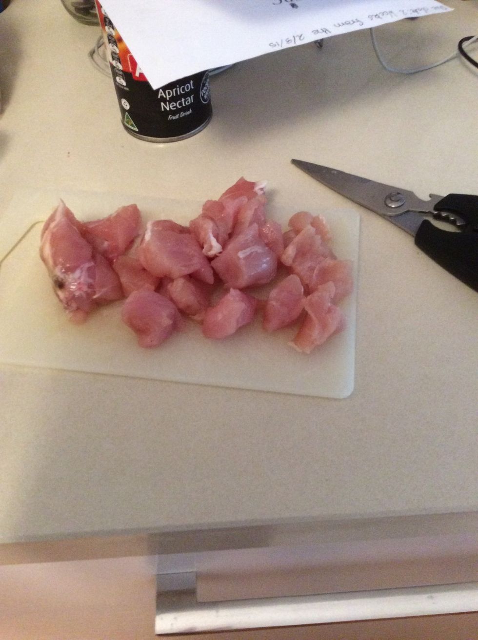 Dice chicken into small squares.
