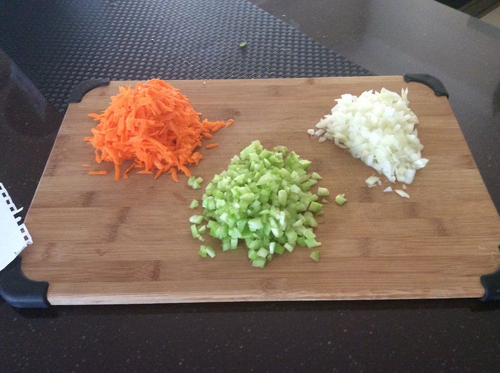 Dice onions and celery. Coarsely grate the carrot.