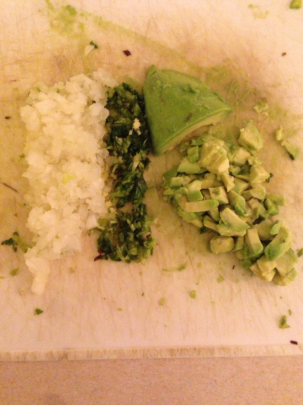 Dice onions, garlic, salad, and avocado