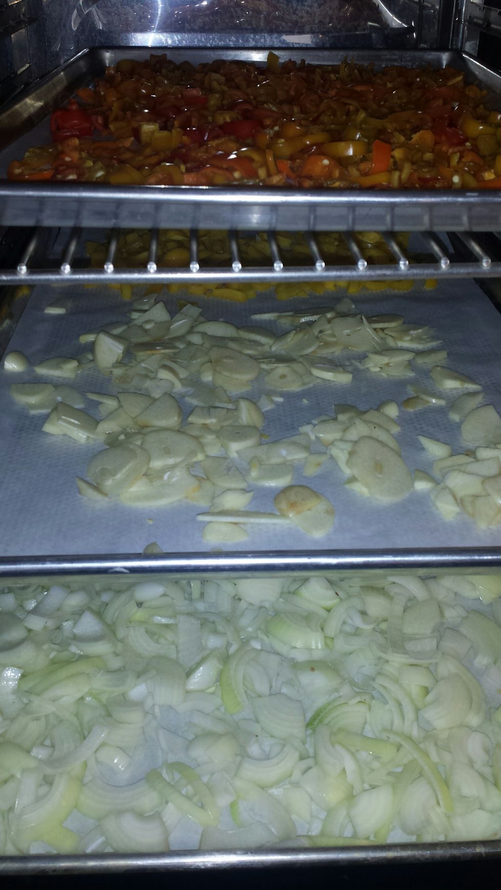 Dice or puree your vegetables and lay out on sheet pans. If chopping, usually a good parchment sheet will suffice but if pureeing them, a silicone mat would be best to avoid sticking.